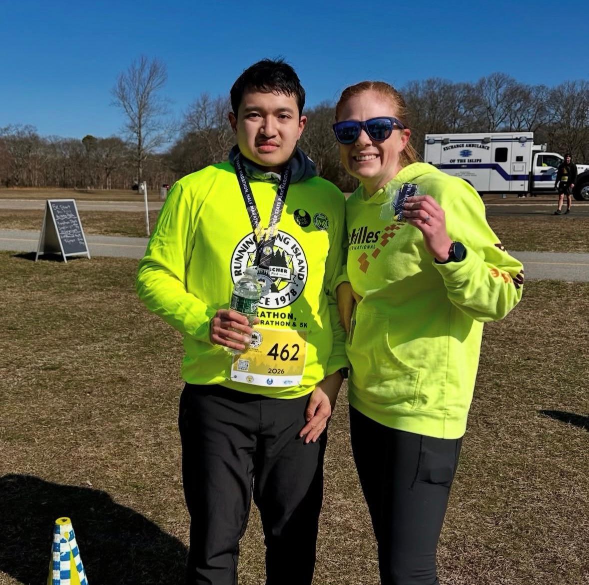 Kyle and Lauren displaying their awards